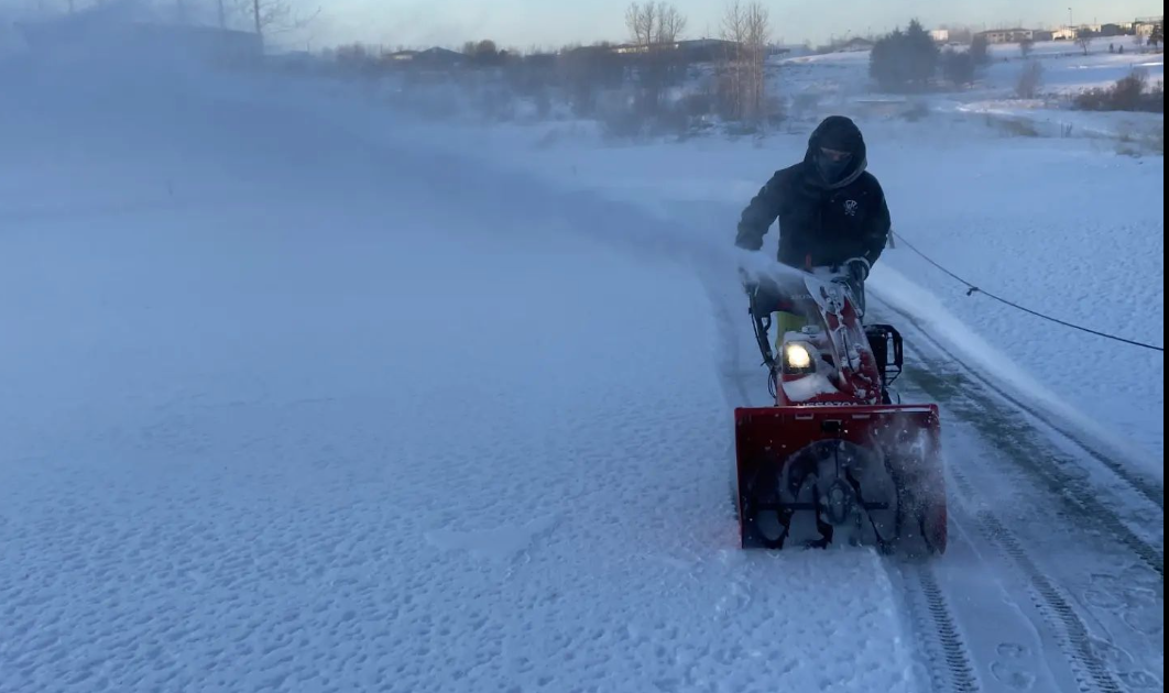 Snjóhreinsun fyrir hlákuna