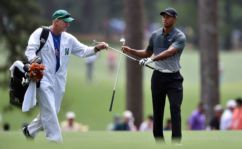 Borgaði rúmar fimm milljónir til að bera kylfur Tiger Woods
